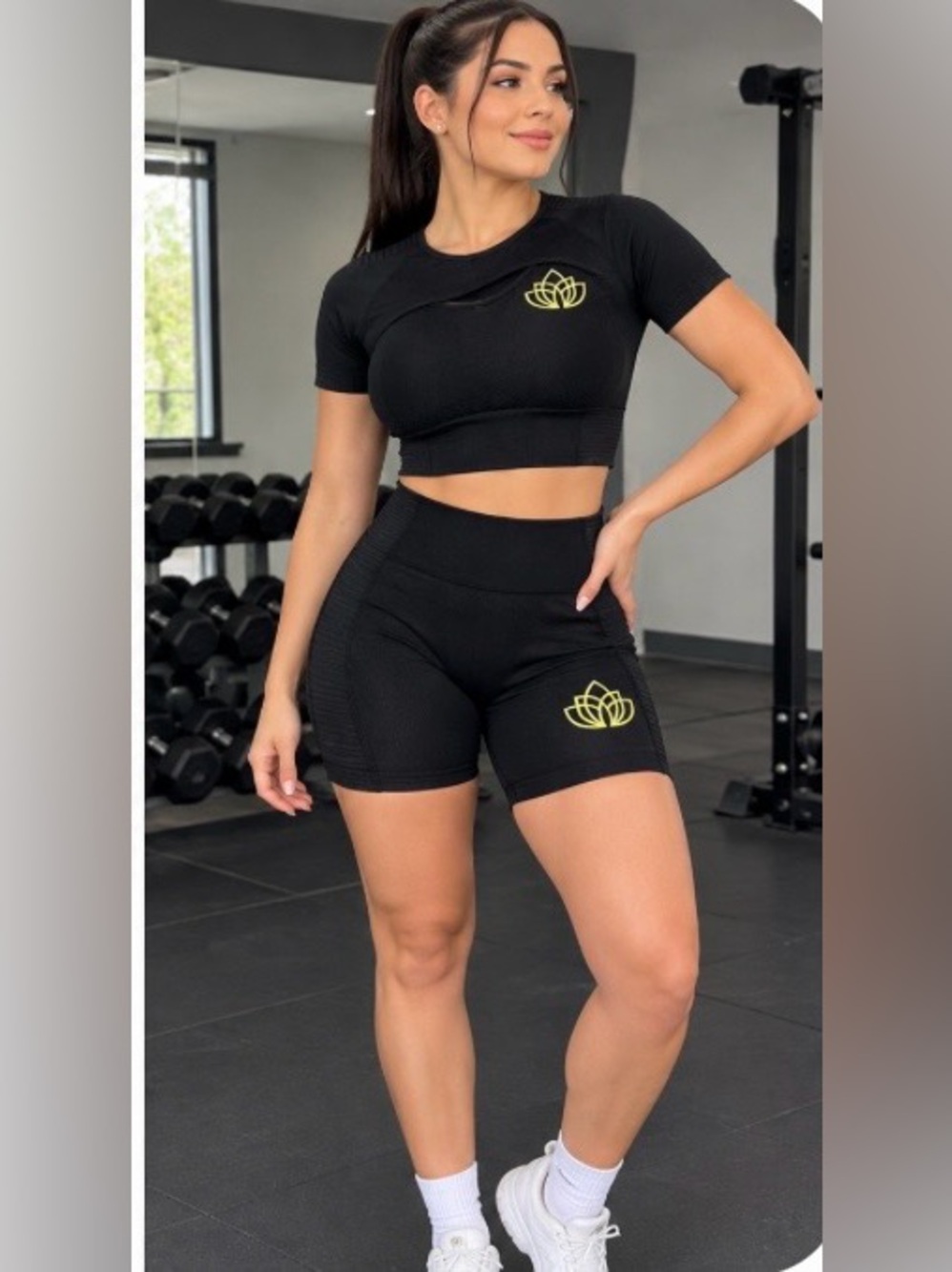 High-Rise Black Bike Shorts with Yellow Lotus Accent